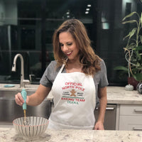 Model  wearing white North Pole Baking Team Embroidered Apron. - Life Has Just Begun